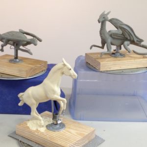 Clay sculptures of dragons and a horse