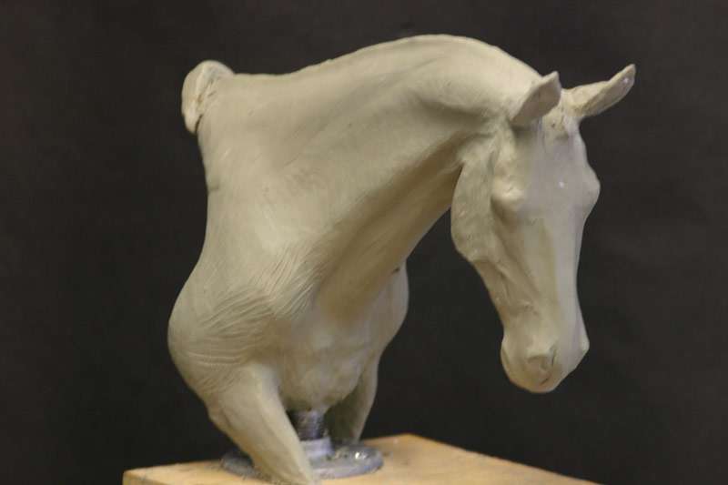 clay sculptures of horses